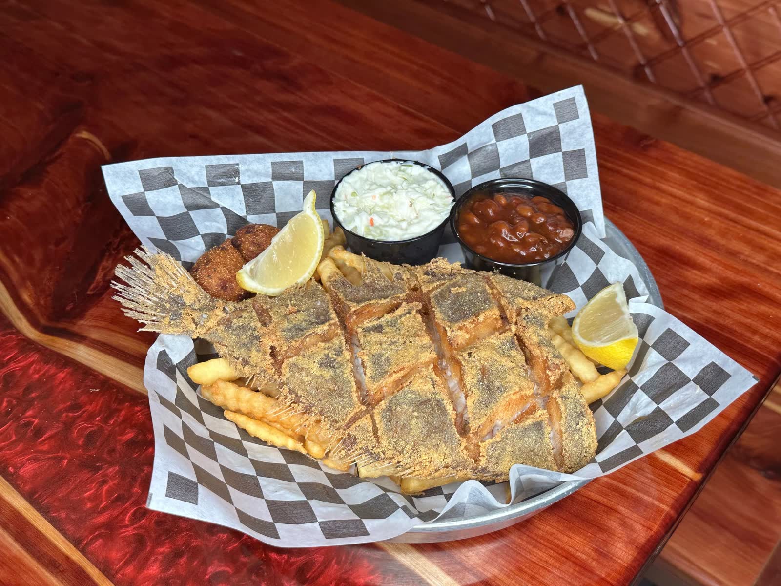 Seasoned boiled shrimp piled high with corn and sausage